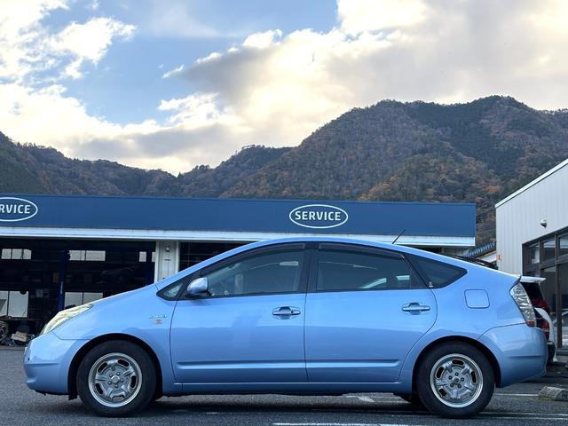 プリウス Ｓ　１０ｔｈアニバーサリーエディション　社外１５インチアルミ装着・純正ナビ・バックモニター・ＥＴＣ・ステアリングスイッチ・クルーズコントロール・ヘッドライト塗装（7枚目）