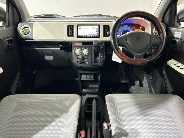 アルト Ｌ　レーダーＢＳ　横滑り防止　シートヒーター　ＥＴＣ　Ａストップ　メモリーナビ　フルセグＴＶ　Ｂｌｕｅｔｏｏｔｈ　ＵＳＢ　ＤＶＤ　社外１３インチＡＷ　キーレス　エアコン　パワステ　パワーウィンドウ　ＡＢＳ（7枚目）