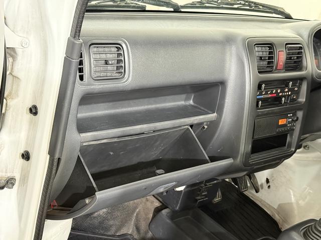 キャリイトラック ＫＣエアコン・パワステ　５速ＭＴ　４ＷＤ　三方開　エアコン　パワーステアリング　ヘッドライトレベライザー　保証付き　室内清掃済み（59枚目）