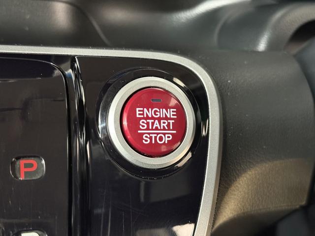 N-BOX G ターボSSパッケージ Bカメラ ETC 両PSD クルコン ナビTV DVD ESC HIDオートライト Pスタート パドルシフト ステリモ AAC 社外14インチAW ウィンカー付電動格納ミラー シートハイトアジャスター(12枚目)