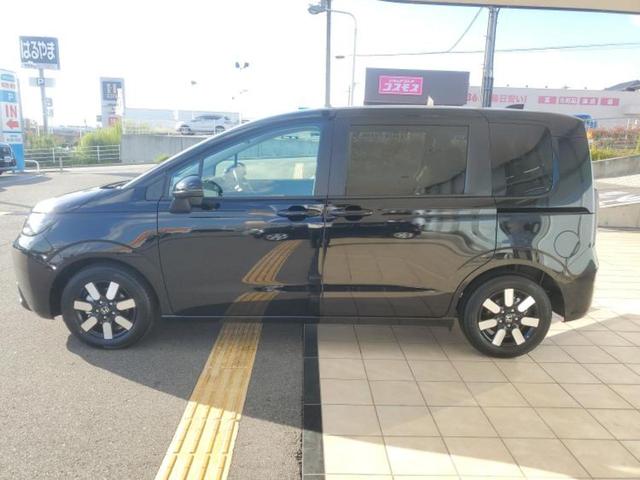 フリード ｅＨＥＶエアーＥＸ　保証書／純正　９インチ　ナビ／ホンダセンシング／両側電動スライドドア／シートヒーター　前席／車線逸脱防止支援システム／登録済未使用車／ヘッドランプ　ＬＥＤ／Ｂｌｕｅｔｏｏｔｈ接続／ＥＢＤ付ＡＢＳ（2枚目）