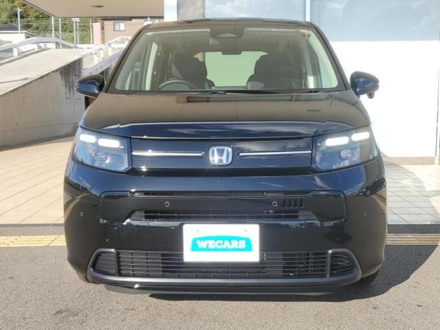 フリード ｅＨＥＶエアーＥＸ　保証書／純正　９インチ　ナビ／ホンダセンシング／両側電動スライドドア／シートヒーター　前席／車線逸脱防止支援システム／登録済未使用車／ヘッドランプ　ＬＥＤ／Ｂｌｕｅｔｏｏｔｈ接続／ＥＢＤ付ＡＢＳ（57枚目）