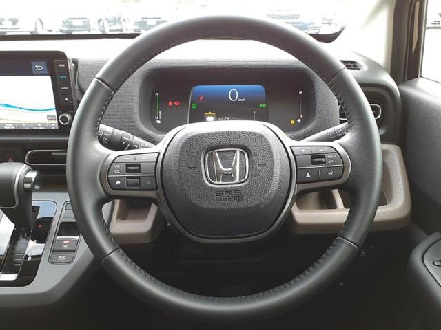 フリード ｅＨＥＶエアーＥＸ　保証書／純正　９インチ　メモリーナビ／ホンダセンシング／両側電動スライドドア／シートヒーター　前席／車線逸脱防止支援システム／パーキングアシスト　バックガイド／登録済未使用車　衝突被害軽減システム（14枚目）