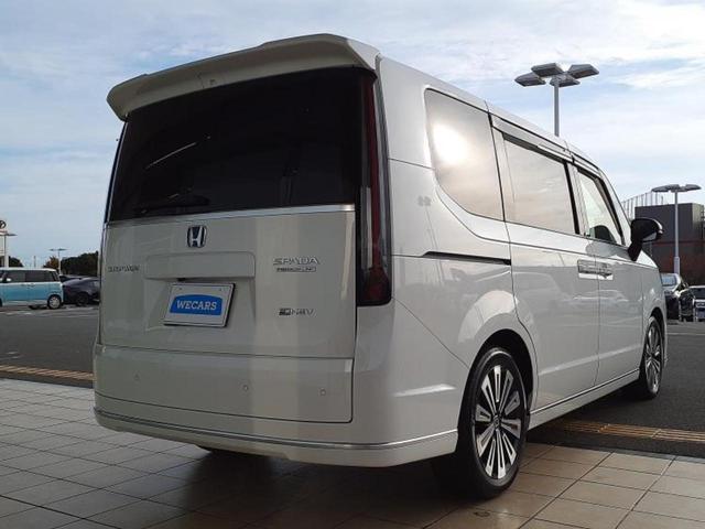 ステップワゴン ｅＨＥＶスパーダプレミアムライン　新品タイヤ／純正　１１インチ　ＳＤナビ／フリップダウンモニター／衝突安全装置／両側電動スライドドア／シートヒーター／車線逸脱防止支援システム／シート　ハーフレザー／電動バックドア　衝突被害軽減システム（3枚目）