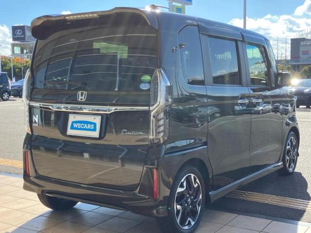 N-BOXカスタム G・Lターボホンダセンシング 新品タイヤ/保証書/純正 8インチ SDナビ/ホンダセンシング/両側電動スライドドア/シートヒーター 前席/車線逸脱防止支援システム/シート ハーフレザー/ドライブレコーダー 前後 バックカメラ(3枚目)