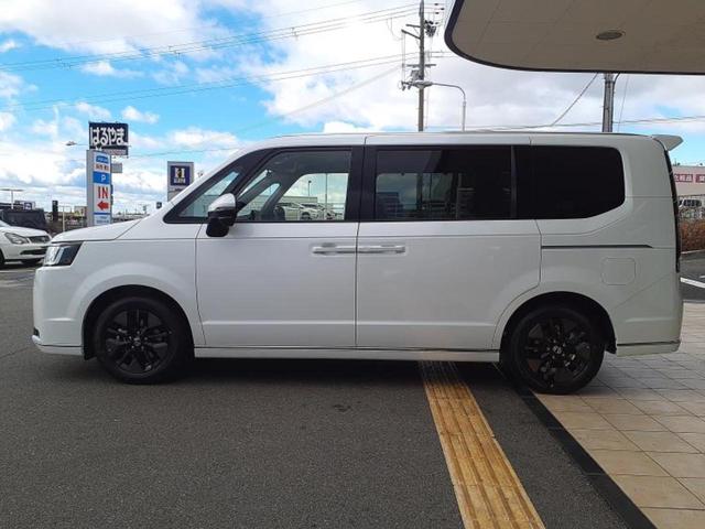 ステップワゴン スパーダ　保証書／純正　１１インチ　ナビ／フリップダウンモニター　純正　１５．６インチ／ホンダセンシング／両側電動スライドドア／シートヒーター　前席／車線逸脱防止支援システム／電動バックドア／登録済未使用車（2枚目）
