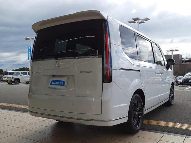 ステップワゴン スパーダ　保証書／純正　１１インチ　ナビ／フリップダウンモニター　純正　１５．６インチ／ホンダセンシング／両側電動スライドドア／シートヒーター　前席／車線逸脱防止支援システム／電動バックドア／登録済未使用車（3枚目）