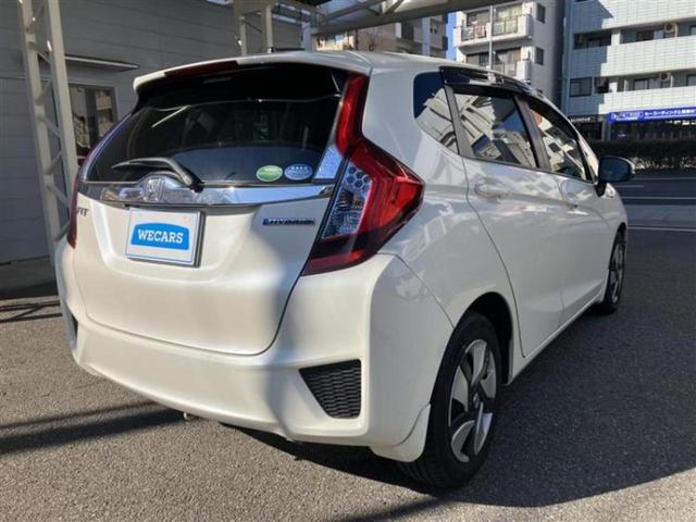 フィットハイブリッド ハイブリッド・Ｌパッケージ　保証書／純正　ＳＤナビ／シート　ハーフレザー／ヘッドランプ　ＨＩＤ／ＥＴＣ／ＥＢＤ付ＡＢＳ／横滑り防止装置／アイドリングストップ／フルセグＴＶ／エアバッグ　運転席／エアバッグ　助手席　盗難防止装置（3枚目）