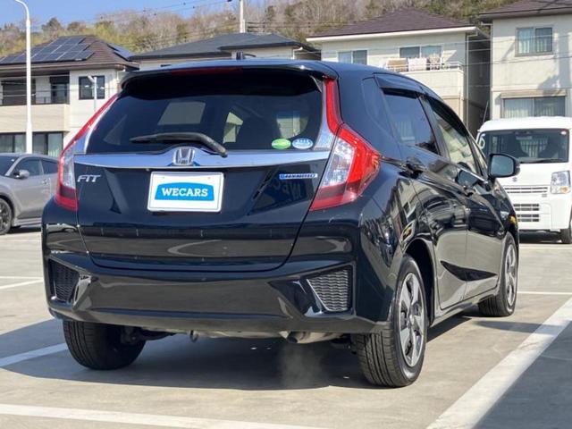 フィットハイブリッド ハイブリッド・Ｌパッケージ　新品タイヤ／保証書／純正　８インチ　ＳＤナビ／シート　ハーフレザー／ヘッドランプ　ＬＥＤ／ＥＴＣ／ＥＢＤ付ＡＢＳ／横滑り防止装置／アイドリングストップ／クルーズコントロール／バックモニター　ＤＶＤ再生（3枚目）