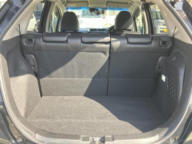 フィットハイブリッド ハイブリッド・Ｌパッケージ　新品タイヤ／保証書／純正　８インチ　ＳＤナビ／シート　ハーフレザー／ヘッドランプ　ＬＥＤ／ＥＴＣ／ＥＢＤ付ＡＢＳ／横滑り防止装置／アイドリングストップ／クルーズコントロール／バックモニター　ＤＶＤ再生（8枚目）