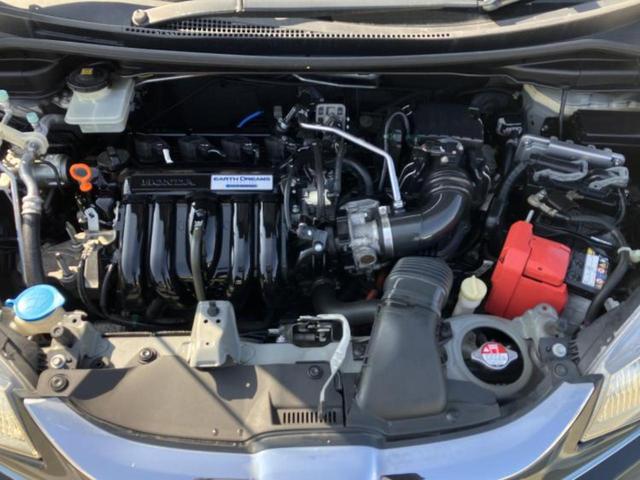 フィットハイブリッド ハイブリッド・Ｌパッケージ　新品タイヤ／保証書／純正　８インチ　ＳＤナビ／シート　ハーフレザー／ヘッドランプ　ＬＥＤ／ＥＴＣ／ＥＢＤ付ＡＢＳ／横滑り防止装置／アイドリングストップ／クルーズコントロール／バックモニター　ＤＶＤ再生（45枚目）