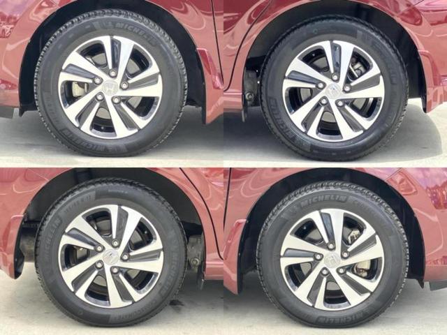 フリード+ハイブリッド ハイブリッドEX 新品タイヤ/保証書/純正 9インチ SDナビ/衝突安全装置/両側電動スライドドア/シートヒーター/車線逸脱防止支援システム/シート ハーフレザー/ヘッドランプ LED/ETC/EBD付ABS(49枚目)