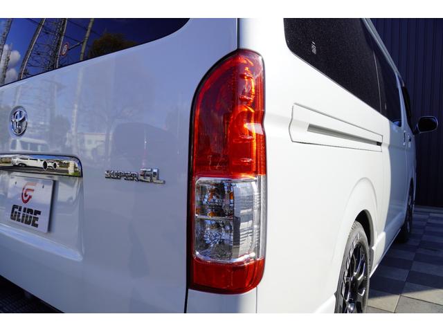 ハイエースバン スーパーＧＬ　ダークプライム　ＵＩビークル足回り　バットフェイスボンネット　ＥＳＳＥＸ１７アルミ　両側パワースライド　キャリパーカバー　ＡＣ１００Ｖ電源　ナビフルセグ　フリップダウンモニター　ＥＴＣ　スマートキー　リアスピーカー（59枚目）