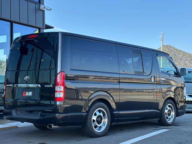 レジアスエースバン ロングスーパーGL 2.0G 2型 新品バットフェイス BARONE16インチAW Mテクノ車高調 5ZIGEN KOMAマフラー Rスライド小窓付 ベッドキット付 ナビ フルセグTV AC100V ETC付き(68枚目)