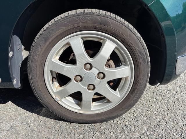 ミラジーノ Ｘリミテッド　距離無制限１年保証付／社外ナビ／Ｂｌｕｅｔｏｏｔｈオーディオ／バックカメラ／オートエアコン／電格ミラー／ＨＩＤヘッドライト／フルセグＴＶ／走行中ＴＶＯＫ／ＥＴＣ／スペアキー有り／取説あり（49枚目）