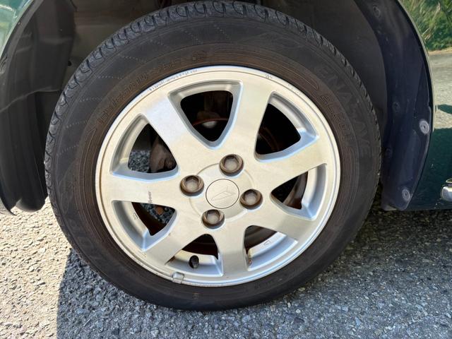 ミラジーノ Ｘリミテッド　距離無制限１年保証付／社外ナビ／Ｂｌｕｅｔｏｏｔｈオーディオ／バックカメラ／オートエアコン／電格ミラー／ＨＩＤヘッドライト／フルセグＴＶ／走行中ＴＶＯＫ／ＥＴＣ／スペアキー有り／取説あり（52枚目）