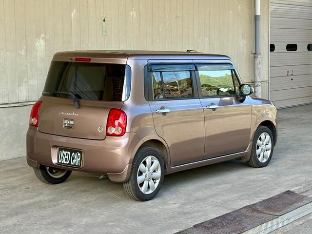 アルトラパン １０ｔｈアニバーサリーリミテッド　距離無制限１年保証付／社外ナビ／Ｂｌｕｅｔｏｏｔｈオーディオ／社内ウッドパネル／フルセグＴＶ／走行中ＴＶＯＫ／シートヒーター／フロントフォグランプ／スペアキー有り／オートライト／オートエアコン（2枚目）