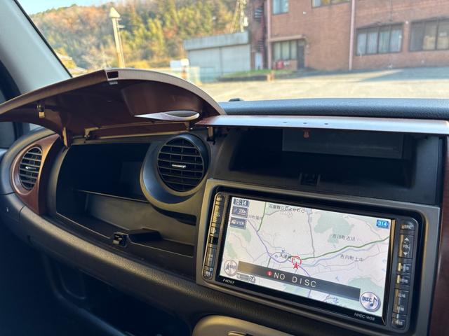 ミラジーノ プレミアムX 距離無制限1年保証付/ユーザー買取/バックカメラ/ナビ/オートエアコン/MOMOウッドステアリング/社外ホワイトアルミ/取説あり/メンテナンスノートあり/トノカバーあり/CD/DVD/車検整備付(22枚目)