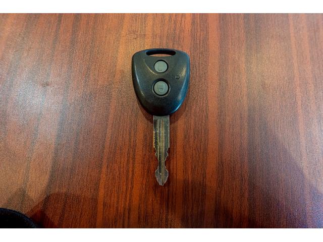 ムーヴコンテ Ｌ　リミテッド　純正オーディオ　パワーシート　シートリフター　オートエアコン　ヘッドライトレベライザー　アームレスト　パワーステアリング　パワーウインド　ＡＢＳ　電動格納ミラー　衝突安全ボディ　キーレスキー（65枚目）