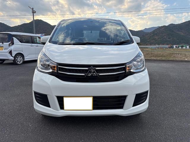 ｅＫワゴン Ｅ　ナビ　ＥＴＣ　シートヒーター　前後ドラレコ　１４インチアルミ　ワイヤレスキー　禁煙車（2枚目）