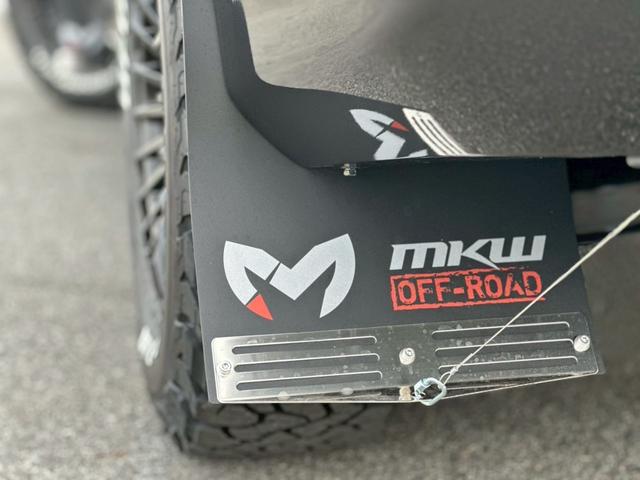 デリカＤ：５ Ｇ　パワーパッケージ　ＷＬボディキット　迷彩デカール　ＧＯＱＢＵＴＯフロントバンパーガード　ＭＡＤＬＹＳヘッドライトプロテクター　オリジナルアルミホイール　ＭＫＷマッドフラップ　デュアルマフラー　ＡＬＰＩＮＥ１１型ナビ（18枚目）