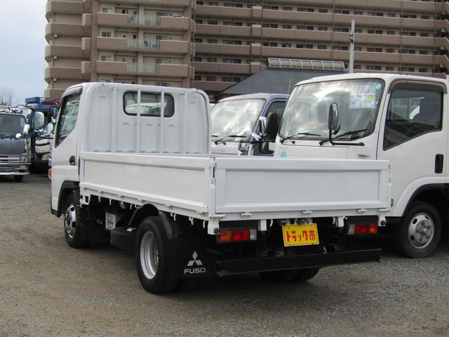 三菱ふそう キャンター その他 平ボディー 積載量２ｔ 全低床 ４ナンバー １０尺 車両総重量５ｔ未満 荷台床板張り 社外ナビ ｔｖ バックカメラ 三方開 左電格ミラー ディーゼル ａｔの中古車在庫詳細 トラック市 明石西インター店 中古車在庫 中古車販売情報を探す