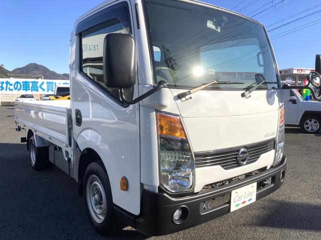 アトラストラック 　スーパーロー　平ボディ１．５ｔ　スチールデッキ　Ｗタイヤ　荷台長３０９０　幅１６００　高３８０　床面地上高７５０　車両総重量３３０５Ｋｇ　坂道発進補助　５速ミッション　３ペダル　電動格納ミラー（4枚目）