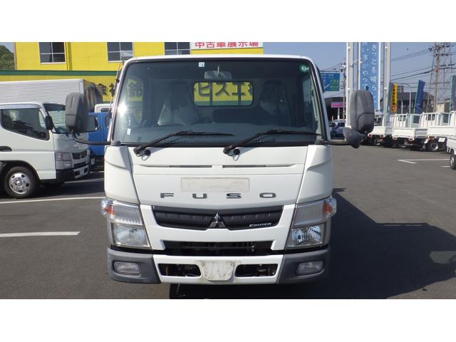 キャンター 全低床　積載２ｔ　新明和製垂直パワーゲート　ＲＥ０６　５ＭＴ　車両総重量　４，４６５Ｋｇ　荷台内寸　長さ：３０５ｃｍ　幅：１６０ｃｍ　高さ：３８ｃｍ　キーレス　エアコン　パワーステアリング　パワーウィンドウ（3枚目）