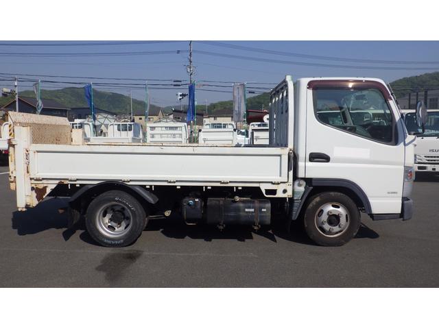 キャンター 全低床　積載２ｔ　新明和製垂直パワーゲート　ＲＥ０６　５ＭＴ　車両総重量　４，４６５Ｋｇ　荷台内寸　長さ：３０５ｃｍ　幅：１６０ｃｍ　高さ：３８ｃｍ　キーレス　エアコン　パワーステアリング　パワーウィンドウ（5枚目）