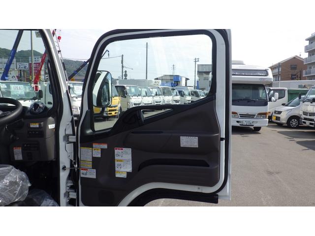 キャンター 　積載３ｔ　アームロール　脱着装置付コンテナ専用車　新明和工業　５ＭＴ　４ナンバー　衝突軽減ブレーキ　車線逸脱警報　ＬＥＤヘッドライト　ＬＥＤフォグランプ　フル液晶メーター　ステアリングスイッチ（58枚目）