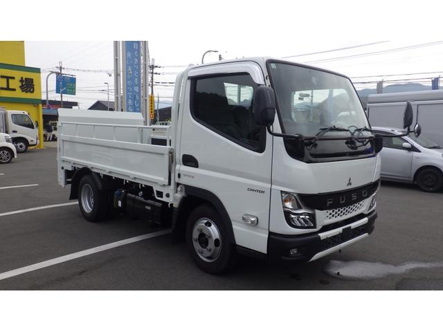 キャンター 全低床　積載２ｔ　ＡＴ車　極東製垂直パワーゲート　Ｖ６０１Ｃ　床鉄板　パイプ欄干　車両総重量　４，５８５Ｋｇ　荷台内寸　長さ：３０５ｃｍ　幅：１６０ｃｍ　高さ：３８ｃｍ　ＥＴＣ　スマートキー（4枚目）