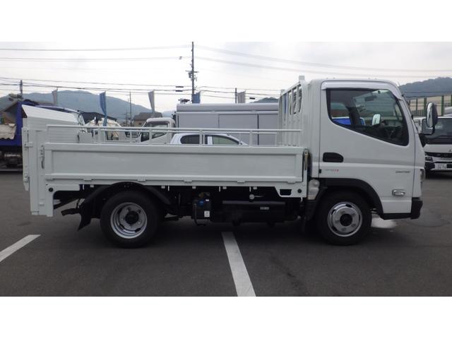 キャンター 全低床　積載２ｔ　ＡＴ車　極東製垂直パワーゲート　Ｖ６０１Ｃ　床鉄板　パイプ欄干　車両総重量　４，５８５Ｋｇ　荷台内寸　長さ：３０５ｃｍ　幅：１６０ｃｍ　高さ：３８ｃｍ　ＥＴＣ　スマートキー（5枚目）