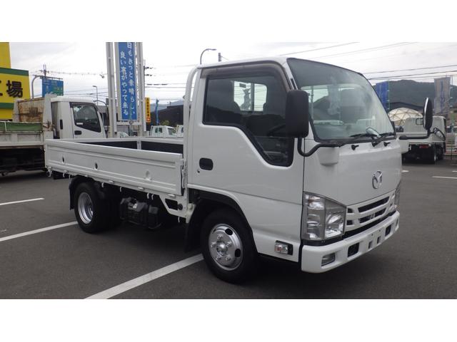 タイタントラック フルワイドロー　積載１．５ｔ　ＡＴ　車両総重量　３，９２５ｋｇ　荷台内寸　長さ：３１０ｃｍ　幅：１６０ｃｍ　高さ：３８ｃｍ　床鉄板　ロープ穴３対　キーレス　ＥＴＣ　ドライブレコーダー　助手席エアバック　エアコン（5枚目）