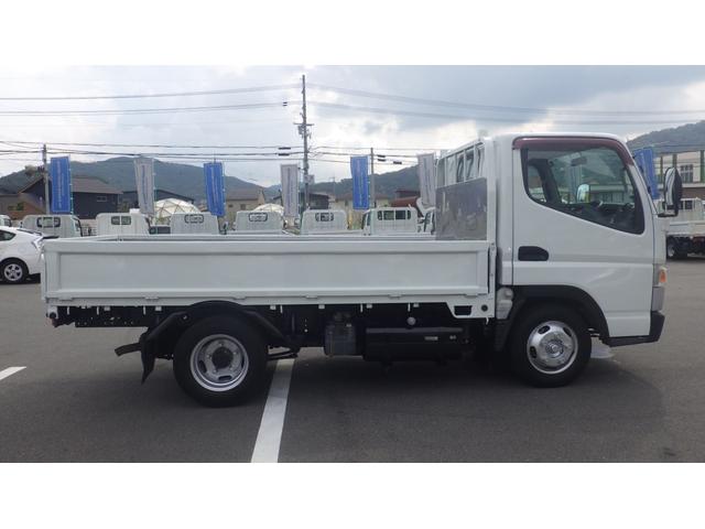 キャンター 全低床　積載２ｔ　５ＭＴ　車両総重量　４，３２５ｋｇ　荷台内寸　長さ：３１０ｃｍ　幅：１６０ｃｍ　高さ：３８ｃｍ　煽内ステン張　エアコン　パワーステアリング　パワーウィンドウ　ディーゼル（6枚目）