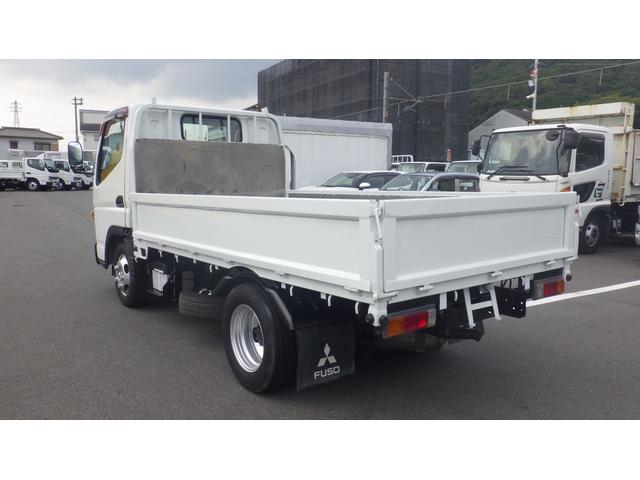 キャンター 全低床　積載２ｔ　５ＭＴ　車両総重量　４，３２５ｋｇ　荷台内寸　長さ：３１０ｃｍ　幅：１６０ｃｍ　高さ：３８ｃｍ　煽内ステン張　エアコン　パワーステアリング　パワーウィンドウ　ディーゼル（10枚目）