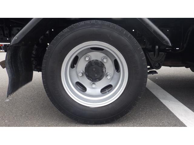 キャンター 全低床　積載２ｔ　５ＭＴ　車両総重量　４，３２５ｋｇ　荷台内寸　長さ：３１０ｃｍ　幅：１６０ｃｍ　高さ：３８ｃｍ　煽内ステン張　エアコン　パワーステアリング　パワーウィンドウ　ディーゼル（32枚目）