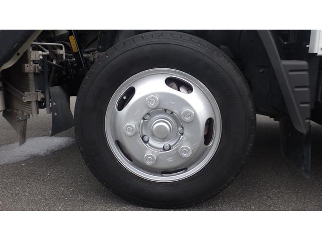 キャンター 全低床　積載２ｔ　５ＭＴ　車両総重量　４，３２５ｋｇ　荷台内寸　長さ：３１０ｃｍ　幅：１６０ｃｍ　高さ：３８ｃｍ　煽内ステン張　エアコン　パワーステアリング　パワーウィンドウ　ディーゼル（34枚目）