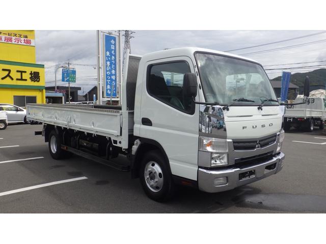 キャンター 超ロング　積載２ｔ　５ＭＴ　車両総重量　４，９６５ｋｇ　荷台内寸　長さ：５００ｃｍ　幅：２０８ｃｍ　高さ：３８ｃｍ　床鉄板　ロープ穴５対　キーレス　ＥＴＣ　フォグ無し　パワーステアリング　パワーウィンドウ（5枚目）