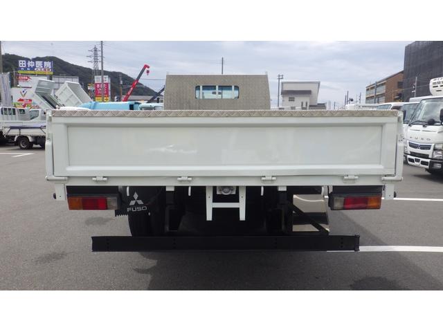 キャンター 超ロング　積載２ｔ　５ＭＴ　車両総重量　４，９６５ｋｇ　荷台内寸　長さ：５００ｃｍ　幅：２０８ｃｍ　高さ：３８ｃｍ　床鉄板　ロープ穴５対　キーレス　ＥＴＣ　フォグ無し　パワーステアリング　パワーウィンドウ（8枚目）