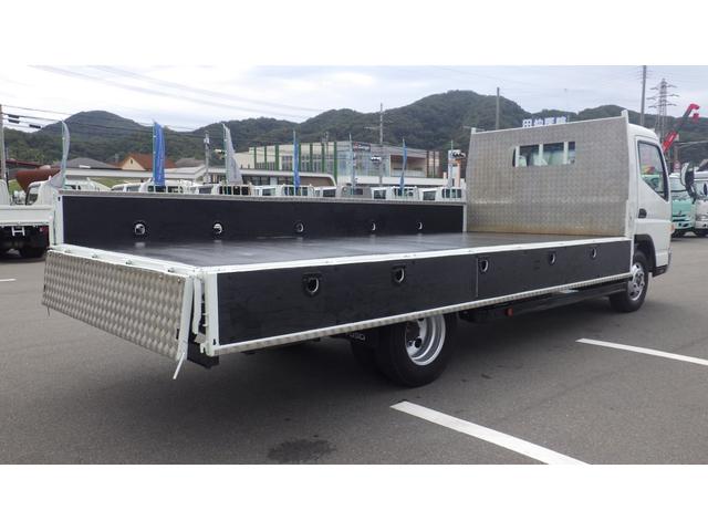 キャンター 超ロング　積載２ｔ　５ＭＴ　車両総重量　４，９６５ｋｇ　荷台内寸　長さ：５００ｃｍ　幅：２０８ｃｍ　高さ：３８ｃｍ　床鉄板　ロープ穴５対　キーレス　ＥＴＣ　フォグ無し　パワーステアリング　パワーウィンドウ（15枚目）