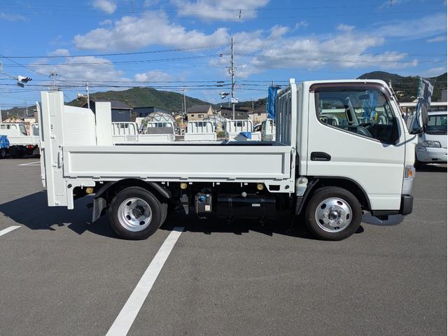 キャンター 　積載２ｔ　５ＭＴ　極東製垂直パワーゲートＶ６００　カーナビ　ＥＴＣ　パワーウインドウ　パワステ　キーレスリモコン　　車両総重量４，７１５ｋｇ　荷台内寸　長さ：３０９ｃｍ　幅：１６１ｃｍ　高さ：３９ｃｍ（7枚目）