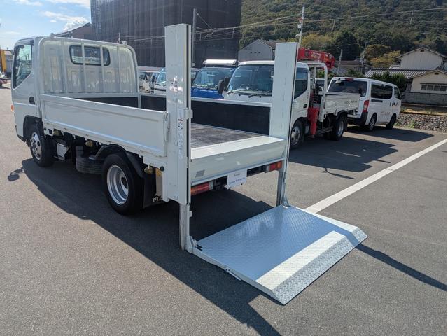 キャンター 　積載２ｔ　５ＭＴ　極東製垂直パワーゲートＶ６００　カーナビ　ＥＴＣ　パワーウインドウ　パワステ　キーレスリモコン　　車両総重量４，７１５ｋｇ　荷台内寸　長さ：３０９ｃｍ　幅：１６１ｃｍ　高さ：３９ｃｍ（23枚目）