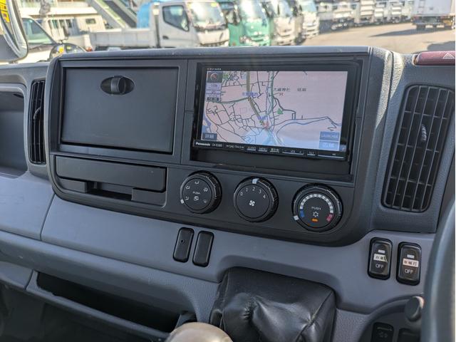 キャンター 　積載２ｔ　５ＭＴ　極東製垂直パワーゲートＶ６００　カーナビ　ＥＴＣ　パワーウインドウ　パワステ　キーレスリモコン　　車両総重量４，７１５ｋｇ　荷台内寸　長さ：３０９ｃｍ　幅：１６１ｃｍ　高さ：３９ｃｍ（37枚目）
