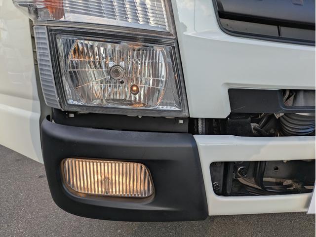 キャンター 　新明和製プレス式塵芥車　４．６立米　積載２．２５ｔ　連続スイッチ　５ＭＴ　車両総重量：６，８２５ｋｇ　ＥＴＣ　バックカメラ　助手席側電動格納ミラー　　路肩灯　フォグランプ　パワーウインドウ（10枚目）