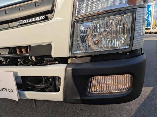 キャンター 　新明和製プレス式塵芥車　４．６立米　積載２．２５ｔ　連続スイッチ　５ＭＴ　車両総重量：６，８２５ｋｇ　ＥＴＣ　バックカメラ　助手席側電動格納ミラー　　路肩灯　フォグランプ　パワーウインドウ（11枚目）