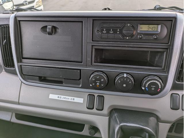 キャンター 　新明和製プレス式塵芥車　４．６立米　積載２．２５ｔ　連続スイッチ　５ＭＴ　車両総重量：６，８２５ｋｇ　ＥＴＣ　バックカメラ　助手席側電動格納ミラー　　路肩灯　フォグランプ　パワーウインドウ（48枚目）