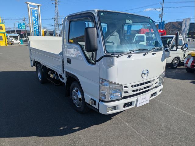 タイタントラック フルワイドロー　積載１．３５ｔ　ＡＴ　新明和製垂直パワーゲート　３，９６５ｋｇ　荷台内寸　長さ：２９０ｃｍ　幅：１６１ｃｍ　高さ：３８ｃｍ　助手席側電動格納ミラー　アイドリングストップ　キーレスリモコン（7枚目）