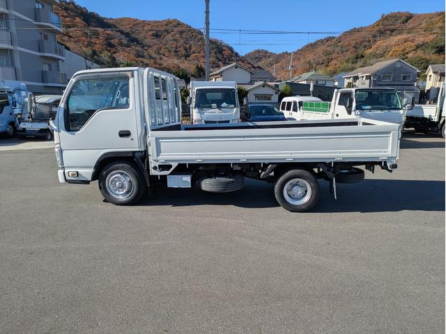 タイタントラック ワイドロー 積載1.5t AT 荷台内寸 長さ:310cm 幅:161cm 高さ:38cm ETC アイドリングストップ キーレスリモコン 助手席側電動格納ミラー パワーウインドウ パワステ オートマチック(6枚目)