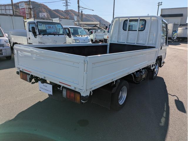 タイタントラック ワイドロー 積載1.5t AT 荷台内寸 長さ:310cm 幅:161cm 高さ:38cm ETC アイドリングストップ キーレスリモコン 助手席側電動格納ミラー パワーウインドウ パワステ オートマチック(7枚目)