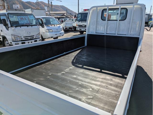 タイタントラック ワイドロー 積載1.5t AT 荷台内寸 長さ:310cm 幅:161cm 高さ:38cm ETC アイドリングストップ キーレスリモコン 助手席側電動格納ミラー パワーウインドウ パワステ オートマチック(11枚目)